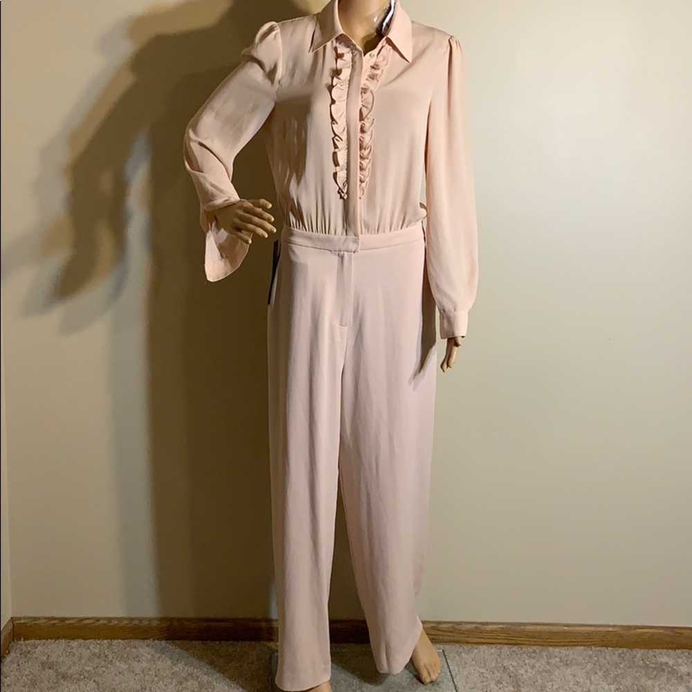 Bebe ruffle front jumpsuit size 8